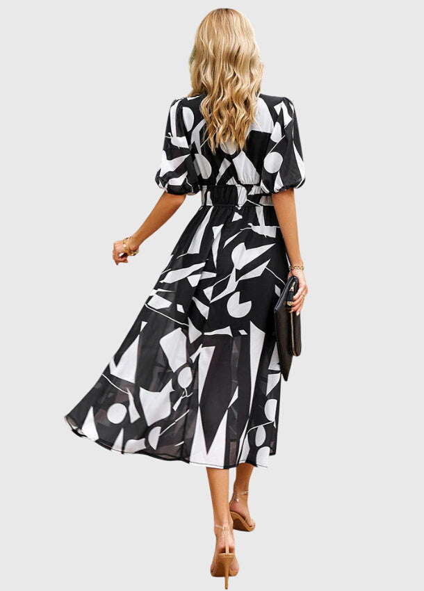 מרלין - שמלת מידי פרחונית מחמיאה