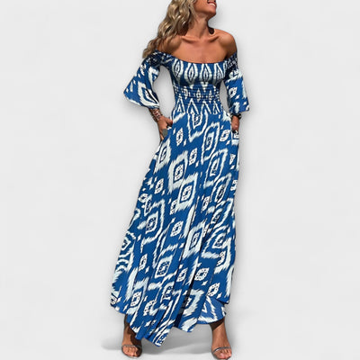 הילה | שמלת כתפיים חשופות בהדפס פרחוני מבד ממוחזר יוקרתי