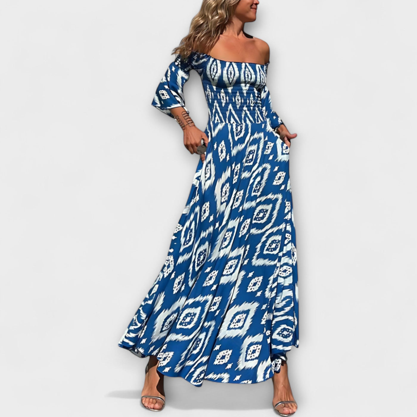 הילה | שמלת כתפיים חשופות בהדפס פרחוני מבד ממוחזר יוקרתי