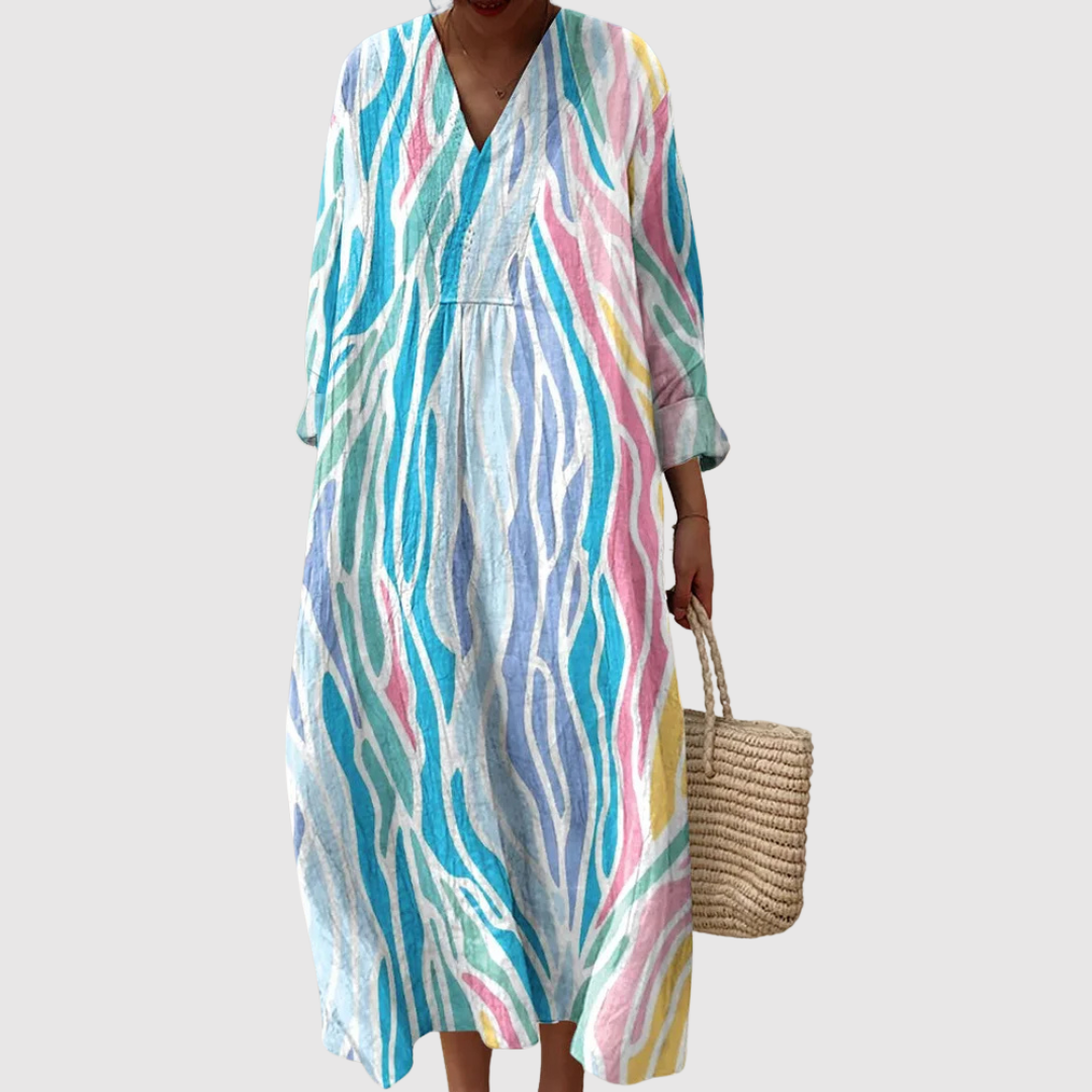 עדי | שמלת קיץ זורמת בגווני פסטל רכים