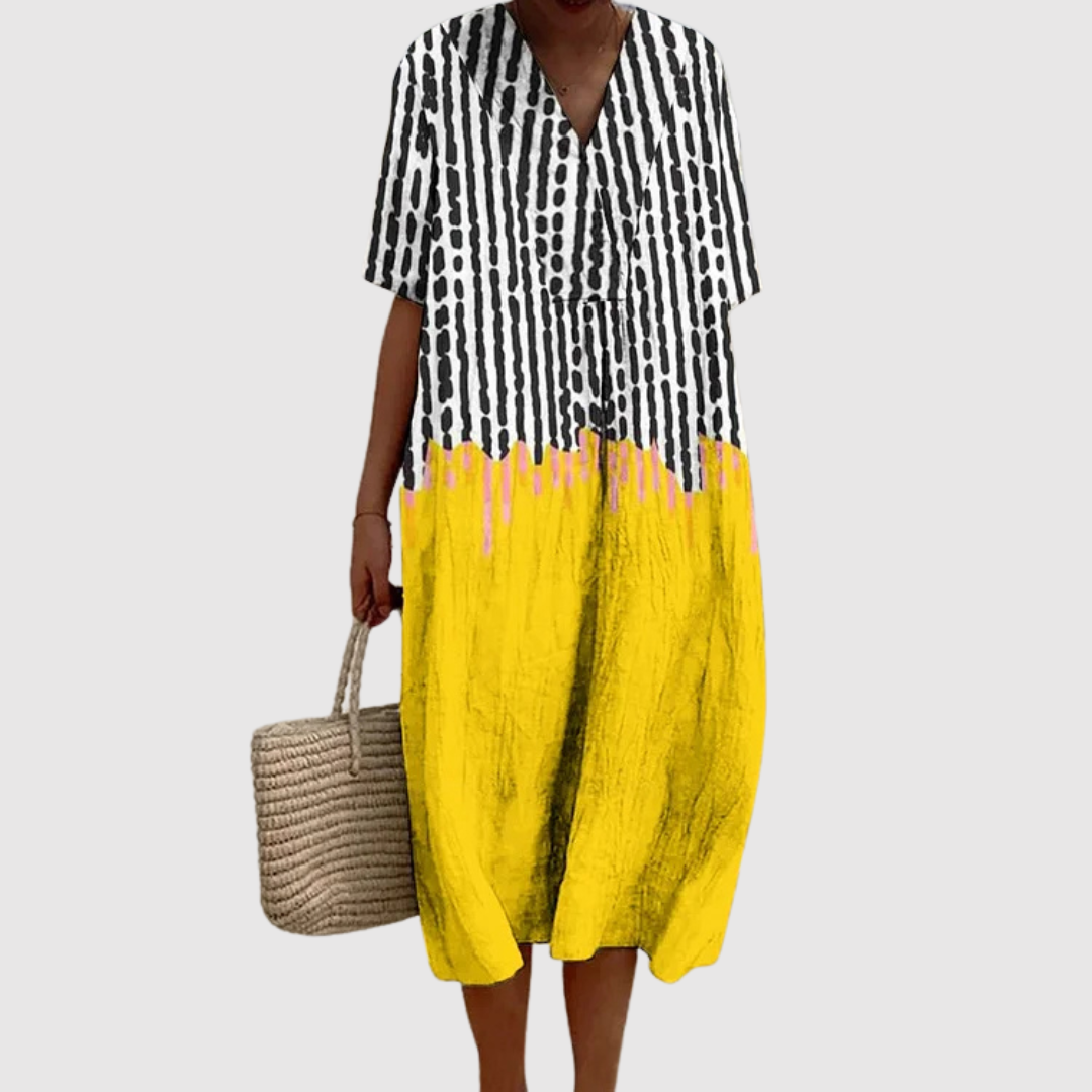 הגר | שמלת מידי קלילה עם נגיעות אמנות מודרניות