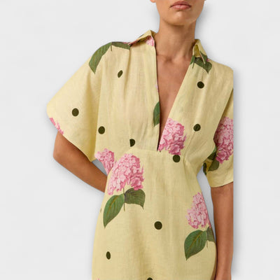 אלישבע | שמלת פולקה דוט אלגנטית ומחמיאה